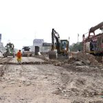 A view of the development work of Red Line BRT is underway with the help of heavy machinery at University Road in the Provincial Capital