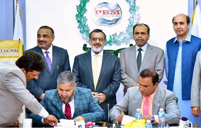 Managing Director Pakistan Bait-ul-Mal Senator Capt. Shaheen Khalid Butt, Rector NUTECH University Lt. General (R) Moazzam Ejaz and Executive Director NAVTTC Muhammad Aamir Jan witnessing the signing of MoU documents regarding strengthening Women’s Economic Empowerment through PBM’s Women Empowerment Centres, at PBM Headquarters