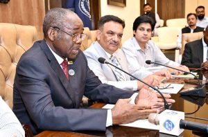 H.E. Titus M. J. Abu-Basutu, Ambassador of the Republic of Zimbabwe to Pakistan, addresses a meeting of exporters at the Sialkot Chamber of Commerce and Industry