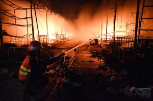 Firefighters and rescue teams battle a massive blaze that broke out at the weekly H-9 Bazaar Peshawar Mor, reducing several shops and stalls to ashes.