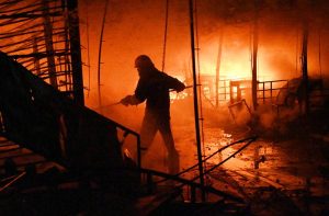 Firefighters and rescue teams battle a massive blaze that broke out at the weekly H-9 Bazaar Peshawar Mor, reducing several shops and stalls to ashes.