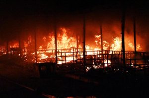 Firefighters and rescue teams battle a massive blaze that broke out at the weekly H-9 Bazaar Peshawar Mor, reducing several shops and stalls to ashes.