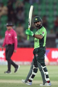 Pakistani batsman Shadab Khan celebrates after complete half century (50 runs) during the second One-Day International (ODI) cricket match between Pakistan and Australia at Gaddafi Stadium. APP/MTF/TZD