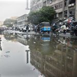 Stagnant sewerage water inundates a section of the busy Zainab Market, causing inconvenience for commuters, affecting business activities, and creating unhygienic conditions for shopkeepers and visitors