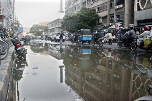 Stagnant sewerage water inundates a section of the busy Zainab Market, causing inconvenience for commuters, affecting business activities, and creating unhygienic conditions for shopkeepers and visitors