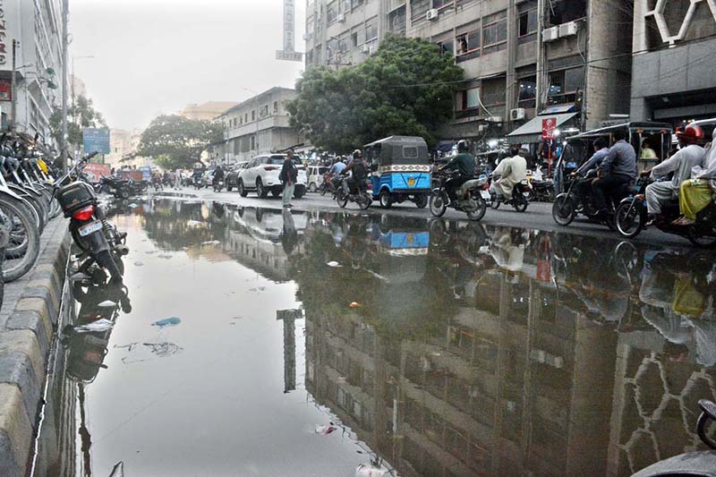 Stagnant sewerage water inundates a section of the busy Zainab Market, causing inconvenience for commuters, affecting business activities, and creating unhygienic conditions for shopkeepers and visitors