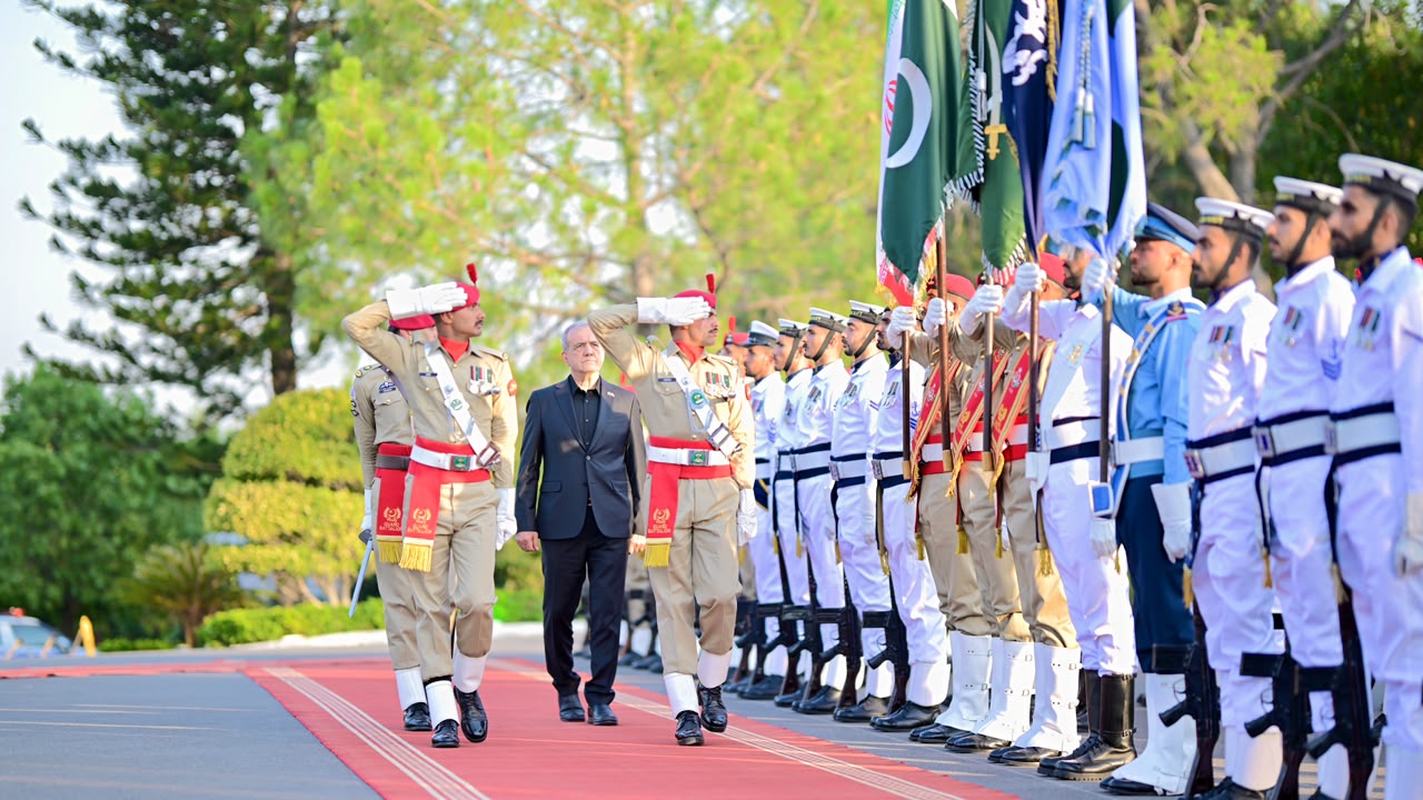 Iranian President arrives at PM House; given a guard of honour