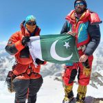 Abbas Ali, 37, from Arandu, Pakistan and renowned alpinist, expedition leader, and mountain guide Benjamin Lieber from Alaska poses with the national flag atop Nanga Parbat (8,125 metres) after reaching the summit on June 30. The expedition team returned to Skardu following the successful ascent. Abbas Ali is among the four Pakistani climbers—including Mehboob Ali Arandu, Muhammad Ali and Ilyas from Hushe—to summit the mountain this year
