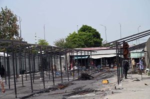 Workers begin reconstruction and rebuilding of shops at H-9 weekly Bazaar, as steel framework structures are erected on the charred remains of the market that was recently gutted in a devastating fire