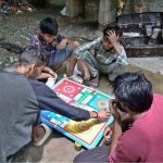 Youngsters are playing Ludo game to spend their time at G-7 in the Federal Capital