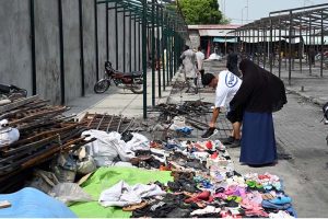 Workers begin reconstruction and rebuilding of shops at H-9 weekly Bazaar, as steel framework structures are erected on the charred remains of the market that was recently gutted in a devastating fire