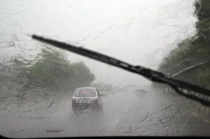 A view from inside a vehicle shows near-zero visibility as heavy rain lashes the road, with commuters cautiously navigating through the downpour. Weather authorities have urged motorists to exercise caution amid ongoing monsoon spells in the Federal Capital.