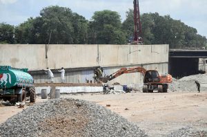 Construction work on the Park Road Underpass near Chak Shahzad, gathers momentum as cranes, excavators and heavy machinery work alongside labourers at the busy site in the Federal Capital.