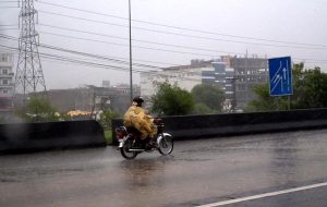 A view from inside a vehicle shows near-zero visibility as heavy rain lashes the road, with commuters cautiously navigating through the downpour. Weather authorities have urged motorists to exercise caution amid ongoing monsoon spells in the Federal Capital.