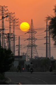 A mesmerizing view of the sunset over the skies of the city.