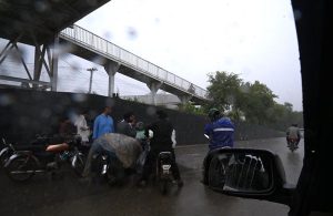 A view from inside a vehicle shows near-zero visibility as heavy rain lashes the road, with commuters cautiously navigating through the downpour. Weather authorities have urged motorists to exercise caution amid ongoing monsoon spells in the Federal Capital.