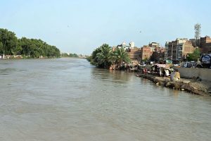 Water flows at a high level through the Phuleli Canal following a rise in water levels.
