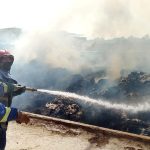 Firefighters struggle to control a fire that erupted at a cotton factory in the Site Area