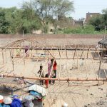 Gypsy families erect temporary shelters along the roadside to use as makeshift homes in the city