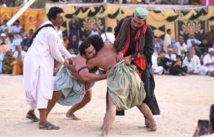 Horse riders in action during traditional game Malhakhra during the 283rd Urs celebration of Hazrat Shah Abdul Latif Bhitai.