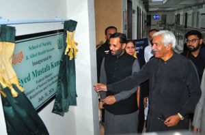 Federal Minister for National Health Services, Regulations and Coordination Syed Mustafa Kamal unveils the inauguration plaque of the School of Nursing and Allied Health Sciences at the Multan University of Science and Technology during a ceremony in the city.
