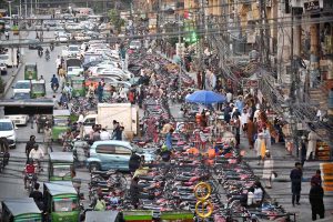 A large number of motorcycles parked on Sixth Road, covering half of the road, are creating problems in the smooth flow of traffic and need the attention of concerned authorities.