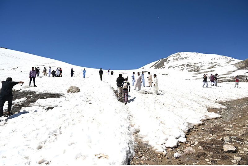 Tourists visit and enjoy the scenic beauty of Burzil Top (Burzil Pass), a historic mountain pass at an elevation of 13,808 feet in the Himalayas. The pass connects Astore Valley with the picturesque Minimarg and Domel regions and, before the partition of the subcontinent, served as a major caravan route linking Srinagar with Gilgit and Skardu