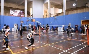 Player in action during inter District Badminton Championship organized by Divisional Sports Department.