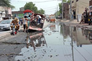 A view of sewerage water accumulated on Jhumra Road needs attention to the concerned authorities.