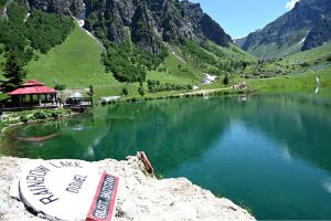 A beautiful view of Rainbow Lake, Rainbow Lake is a stunning, crystal-clear alpine lake located near Domel in the Minimarg Valley of Astore District, Gilgit-Baltistan