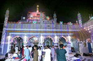 An illuminated view of the shrine of Hazrat Shah Abdul Latif Bhitai decorated with lights on the occasion of his 283rd Urs celebration.