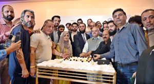Federal Minister for Information & Broadcasting, Attaullah Tarar joins to cut a cake at a prestigious Oath-Taking Ceremony of the newly elected RISJA body organized by Rawalpindi Islamabad Sports Journalists Association (RISJA) at local hotel.