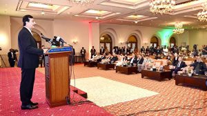 Acting President Syed Yousuf Raza Gilani addressing a special commemorative seminar organised by the Pakistan-China Economic and Cultural Council to mark the 105th anniversary of the founding of the Communist Party of China.