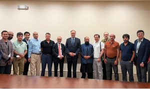 Federal Minister for Planning, Development and Special Initiatives, Ahsan Iqbal in a group photo with members and office-bearers of the Association of Physicians of Pakistani Descent of North America (APPNA) during the 49th Annual Convention of APPNA in Orlando
