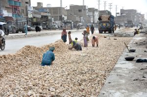 Workers during repairing work of Autobahn Road as part of development work in the city.