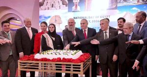 Federal Minister for Commerce Jam Kamal Khan, as chief guest, joining the Ambassador of Egypt and other distinguished guests in cutting the cake at a reception celebrating the National Day of the Arab Republic of Egypt.