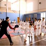 Players of The Karate Academy, University of Sargodha, demonstrate their martial arts skills during a belt promotion ceremony organized in collaboration with the District Sports Department