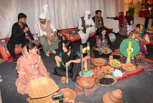 Students dressed in traditional cultural attire participate in a vibrant display of South Punjab's rural heritage during the Mango and Dates Festival 2026 at Muhammad Nawaz Sharif University of Agriculture (MNSUA)
