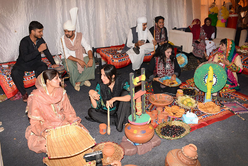 Students dressed in traditional cultural attire participate in a vibrant display of South Punjab's rural heritage during the Mango and Dates Festival 2026 at Muhammad Nawaz Sharif University of Agriculture (MNSUA)