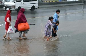 CDA workers clean a drainage nullah along Srinagar Highway as a precautionary measure to ensure the smooth flow of rainwater, prevent urban flooding, and minimize the risk of emergencies during the ongoing monsoon season in the federal capital.