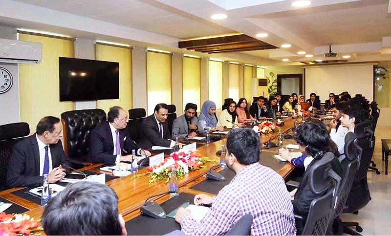 Federal Minister for Finance and Revenue, Senator Muhammad Aurangzeb meeting with participants of the URAAN Overseas Pakistanis Summer Scholars Programme at the Finance Division