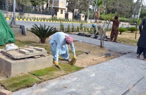 Workers engaged in landscaping along newly constructed roads under the Quetta Development Package.