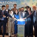 Minister of State for Law and Justice, Barrister Aqeel Malik, presses the button to formally launch the National Action Plan for Human Rights (NAP-HR) 2026 during a ceremony in the federal capital