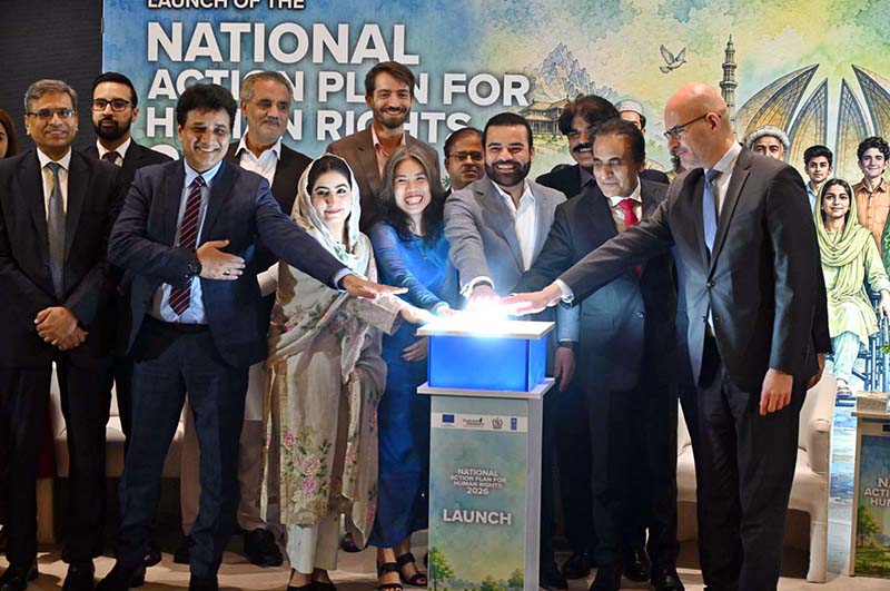 Minister of State for Law and Justice, Barrister Aqeel Malik, presses the button to formally launch the National Action Plan for Human Rights (NAP-HR) 2026 during a ceremony in the federal capital