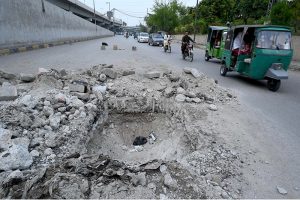 View of an open manhole creates hurdle in the smooth flow of traffic near Radio Pakistan office that needs the attention of concerned authorities