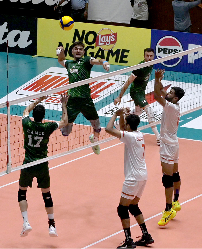 A Pakistani player powerfully smashes the ball against Bangladash match during the Final Match & Closing Ceremony of the CAVA Men’s Volleyball Championship 2026 at Liaquat Gymnasium in the federal capital