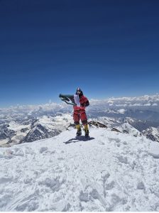 Mehboob Ali, 27, from Arandu, Pakistan, poses with the national flag atop Nanga Parbat (8,125 metres) after reaching the summit on June 30 at 12:13 p.m. The expedition team returned to Chilas today following the successful ascent. Mehboob Ali is among the four Pakistani climbers including Abbas Ali Arandu, Muhammad Ali Hushe and Ilyas Hushe to summit the mountain this year.