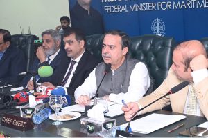 Federal Minister for Maritime Affairs Chaudhry Junaid Anwar addresses a ceremony at the Chamber of Commerce