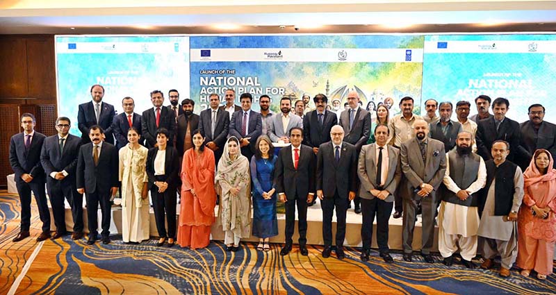 Minister of State for Law and Justice, Barrister Aqeel Malik, poses for a group photograph with participants after the launch of the National Action Plan for Human Rights (NAP-HR) 2026 in the federal capital