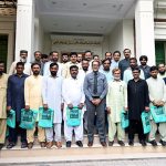 District Public Prosecutor Malik Amir Shahzad poses for a group photograph with newly promoted Class IV employees during a ceremony held in their honour at the District Public Prosecutor Office